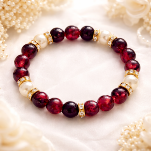 Red and pearl beaded bracelet for women with gold spacers by Sawi Jewellery